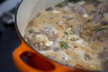 Stir the veal and vegetables during stewing.