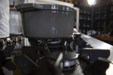 Place the pan on the flame and allow it to get hot.