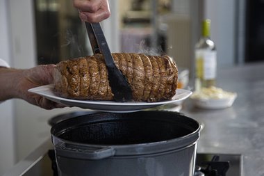 Remove the veal roulade from the pan.
