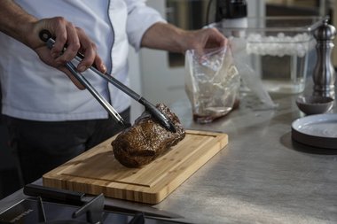  Remove the veal from the bag.