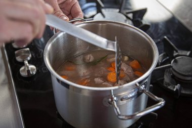 Add the vegetables and herbs and bring to the boil.