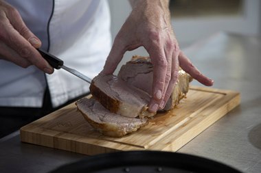 Carve the veal into slices.