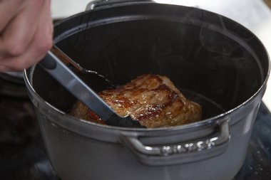 Fry the veal all around for 3-4 minutes until it is light golden brown coloured.