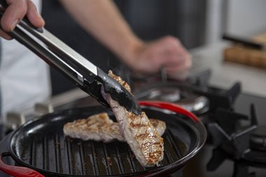 Quarter turn the veal until medium fried.