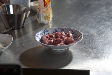 Take the veal strips out of the fridge.